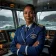 Portrait of Captain Elena Vasquez, Director of Marine Operations at Nordic Shipping